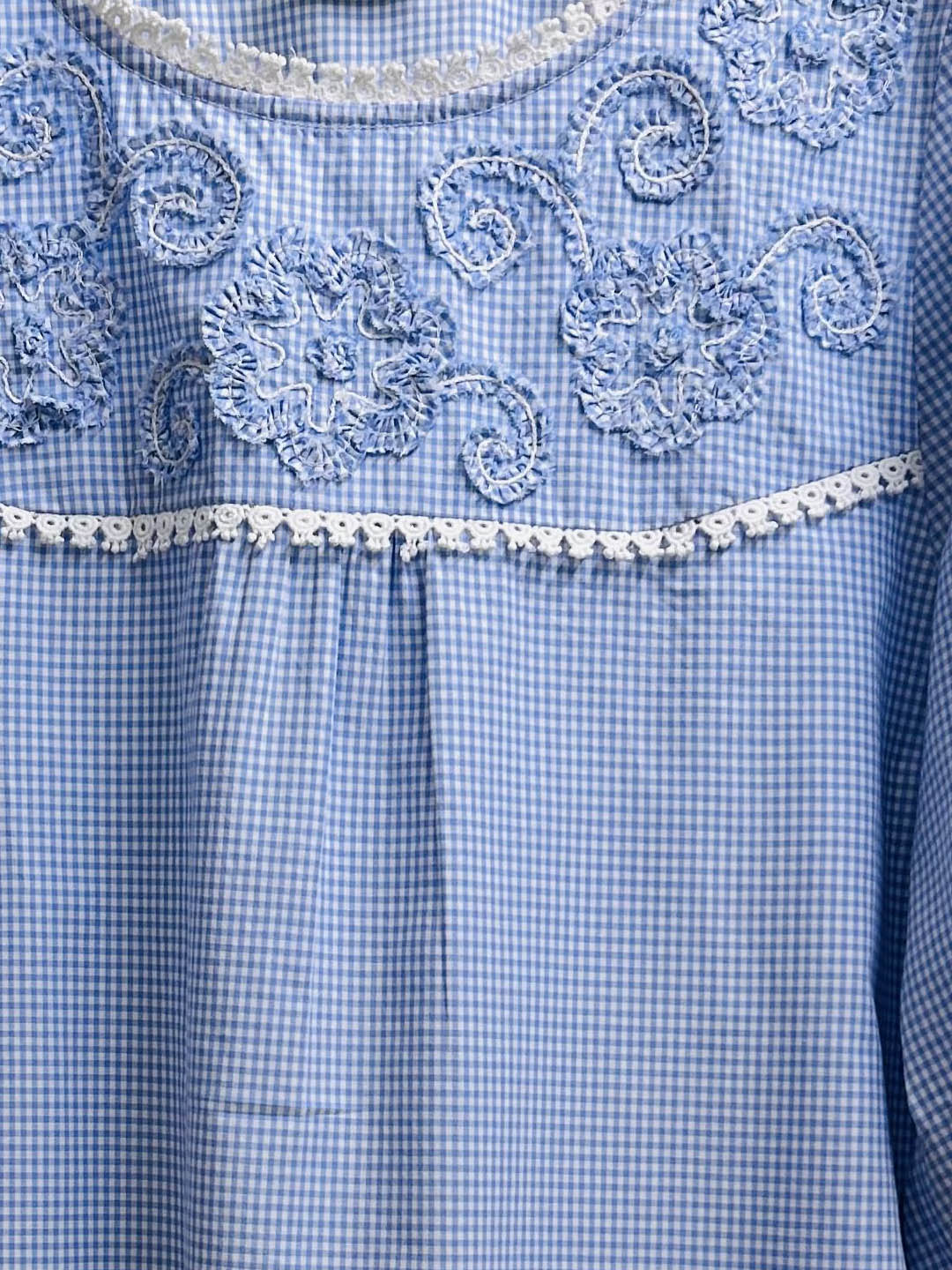 Hand embroidered check top