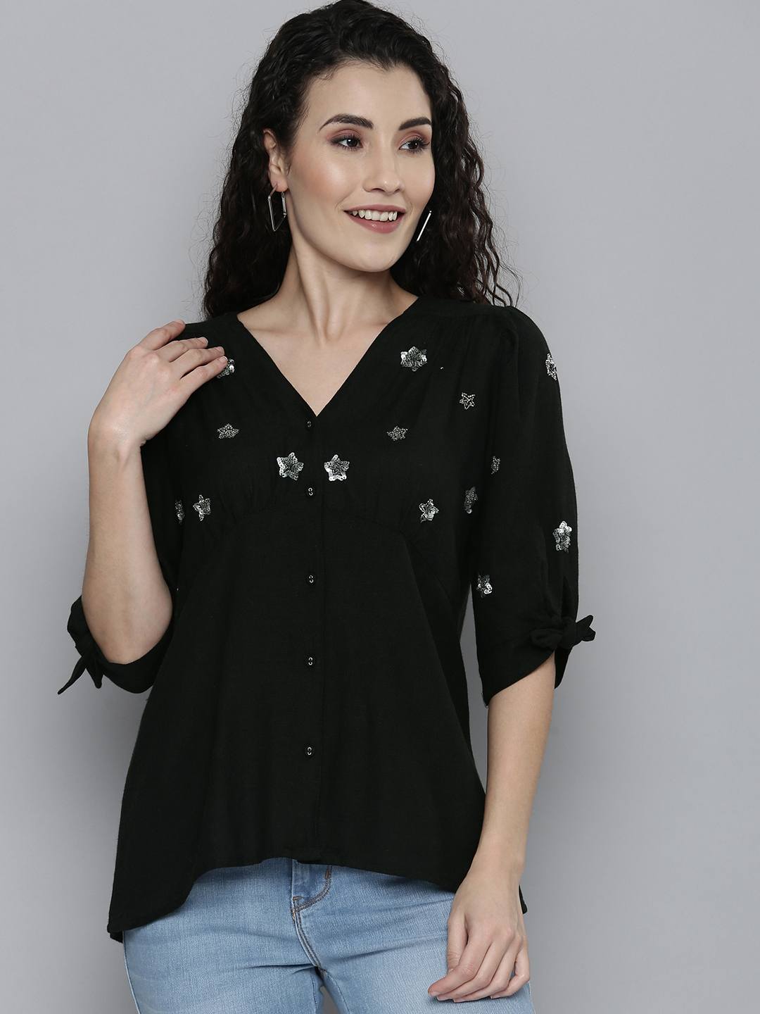 Embellished black top