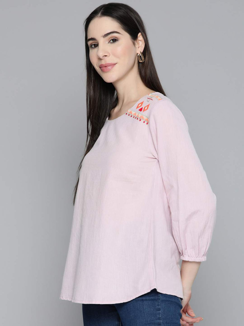 Embroidered mauve top
