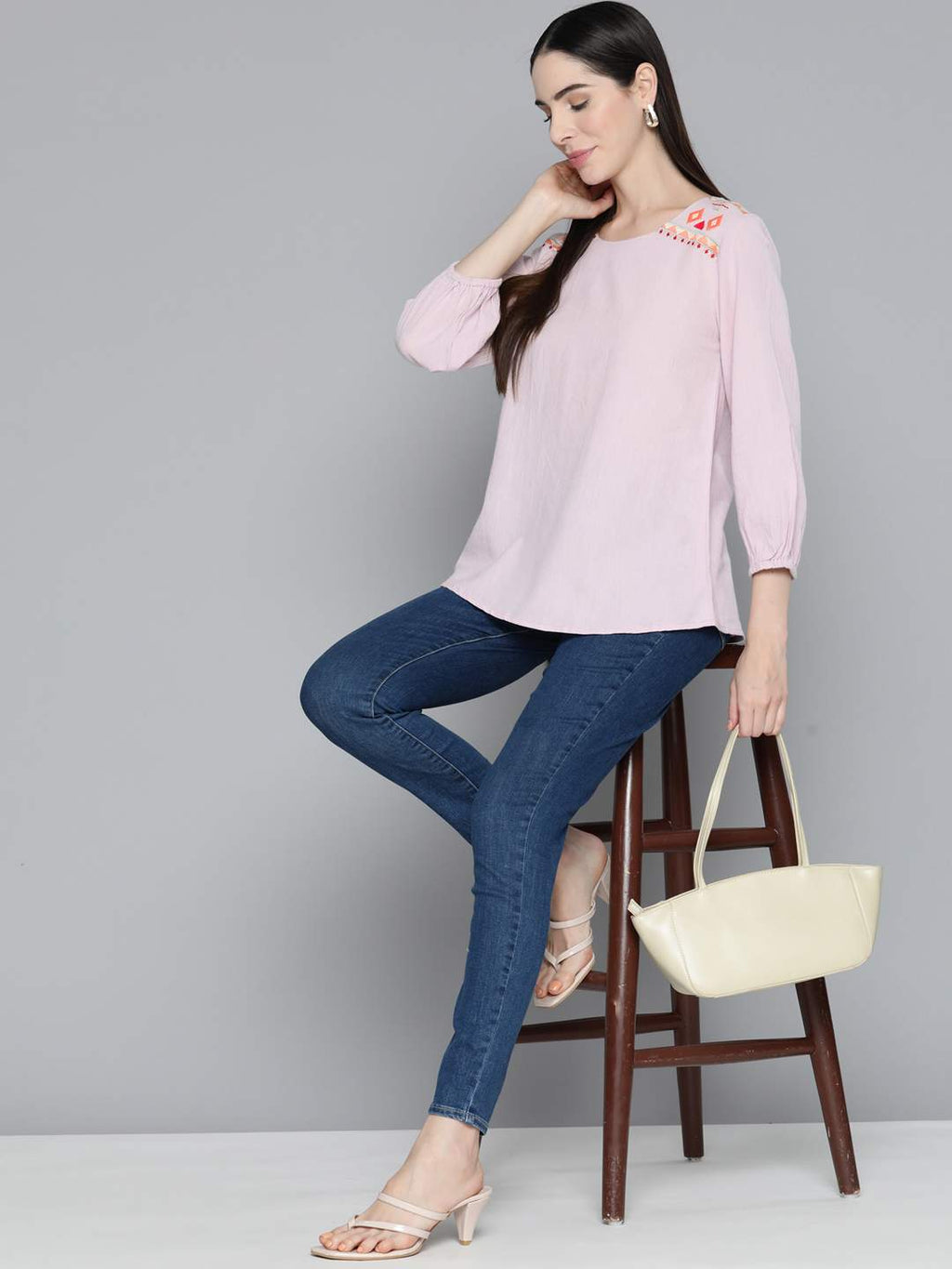 Embroidered mauve top
